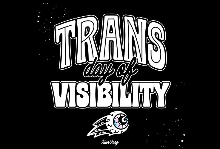 Black image with illustrated text reading "trans day of visibility" small eyeball with trans colours (pink, white, blue) floats beneath text
